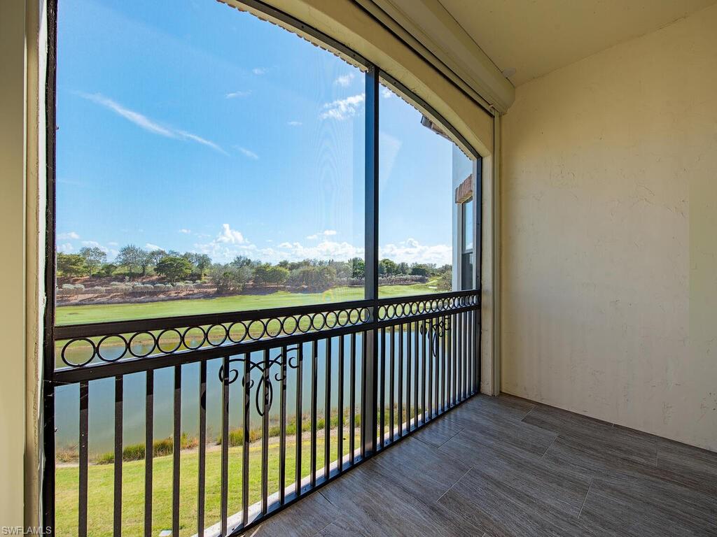 16444 Carrara Way, Unit 7301 Naples, FL 34110 - Photo 17 of 22 a view of city from a balcony