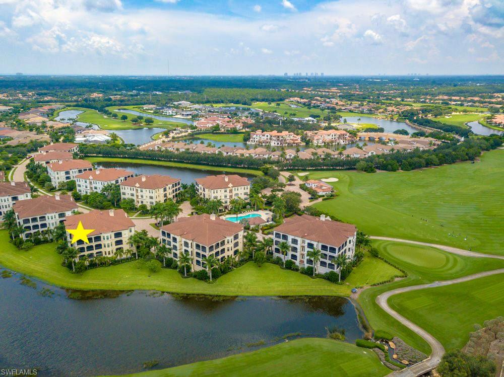 16444 Carrara Way, Unit 7301 Naples, FL 34110 - Photo 21 of 22 an aerial view of a house with a lake view