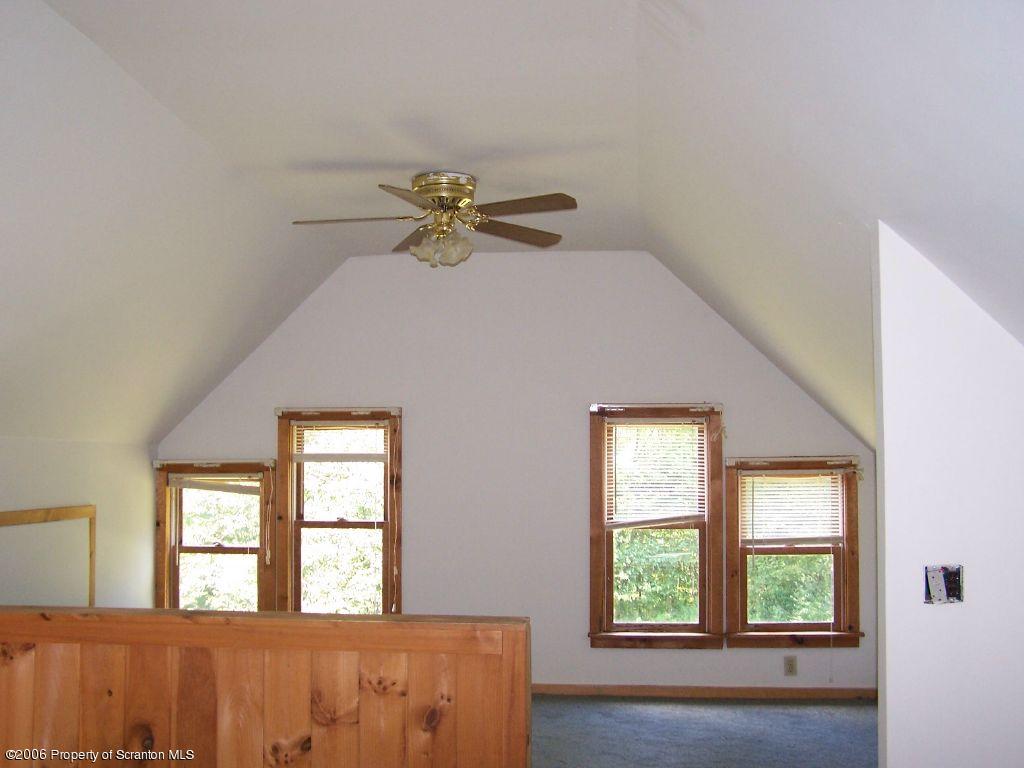 55 East Lemon Road Tunkhannock, PA 18657 - Photo 4 of 8 a view of a livingroom with a window and a kitchen