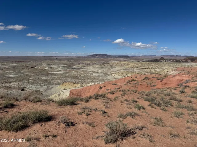 a view of ocean and a mountain