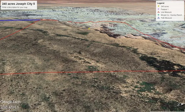 a view of beach and small yard