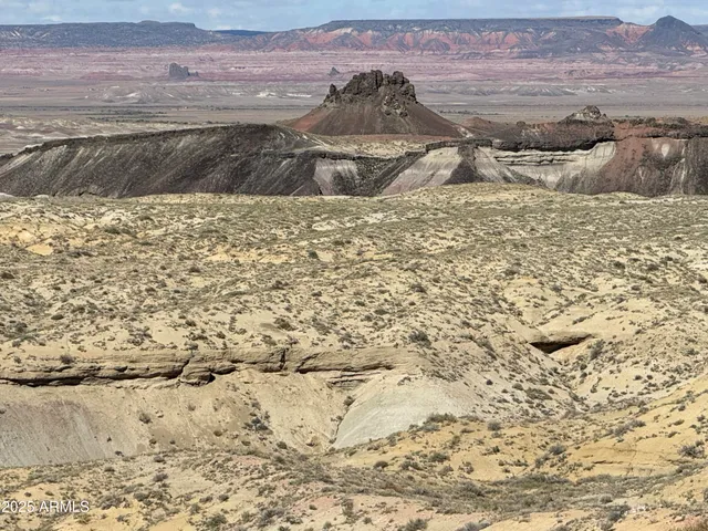a view of ocean and a mountain