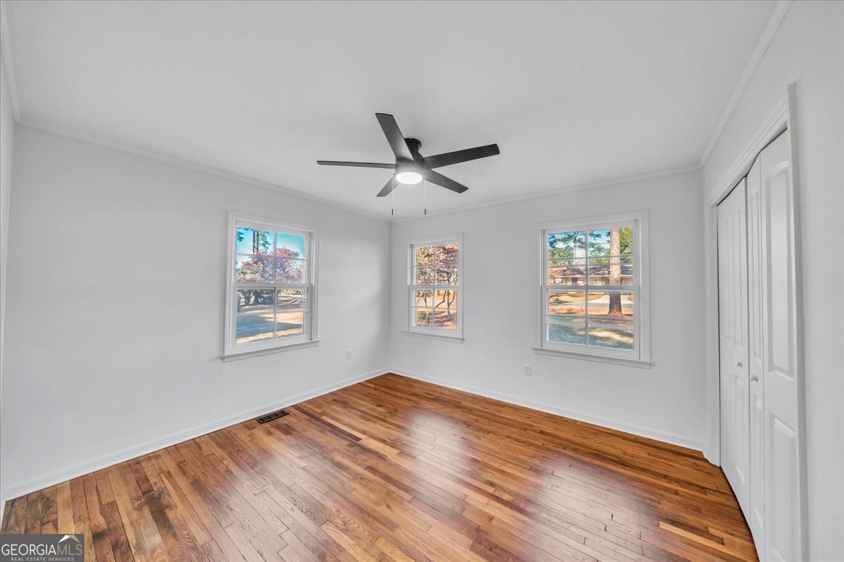 1806 Knox Street Dublin, GA 31021 - Photo 20 of 48 a view of an empty room with a window