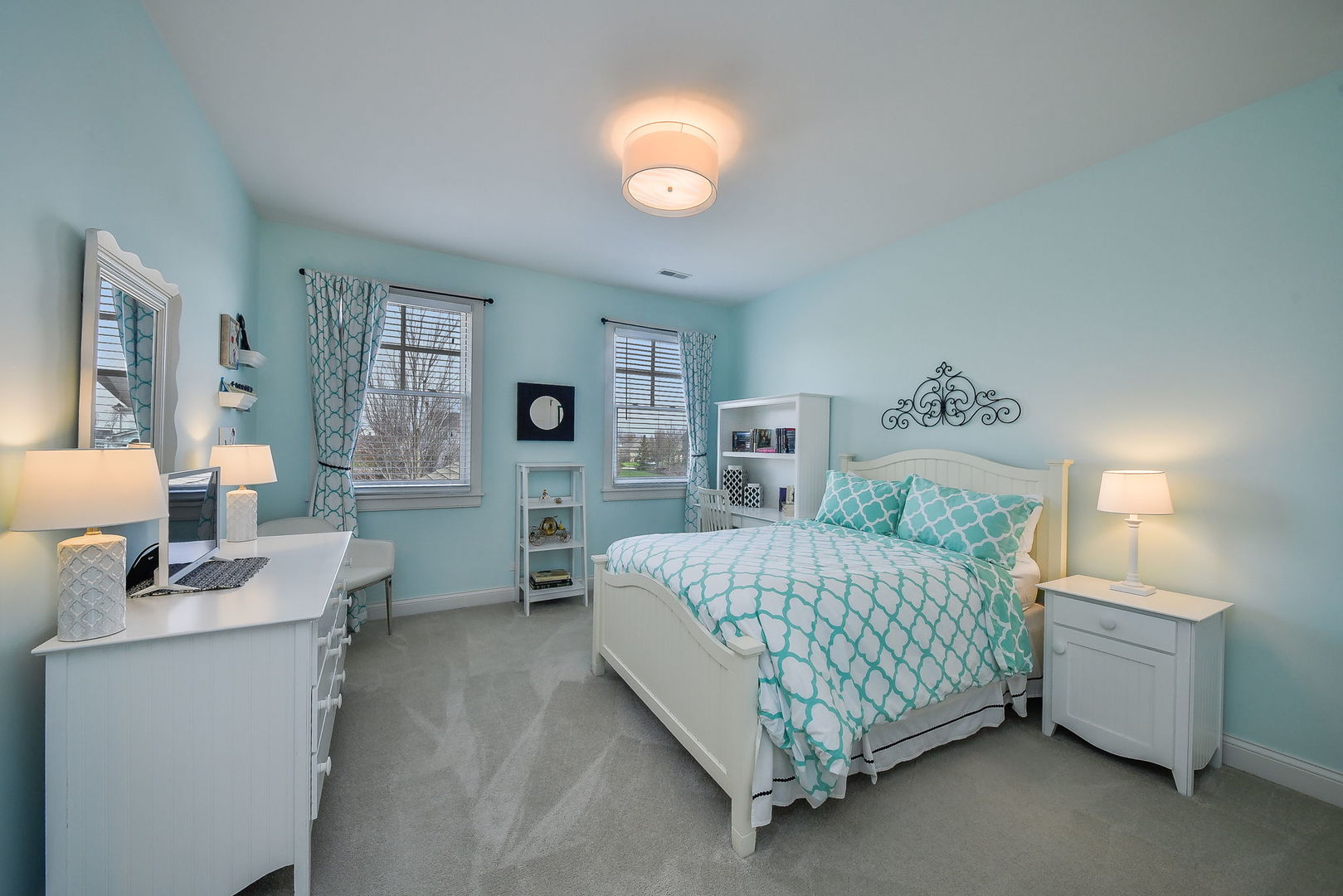 39-w914 Kellar Square Geneva, IL 60134 - Photo 36 of 68 a bedroom with a bed and a chandelier