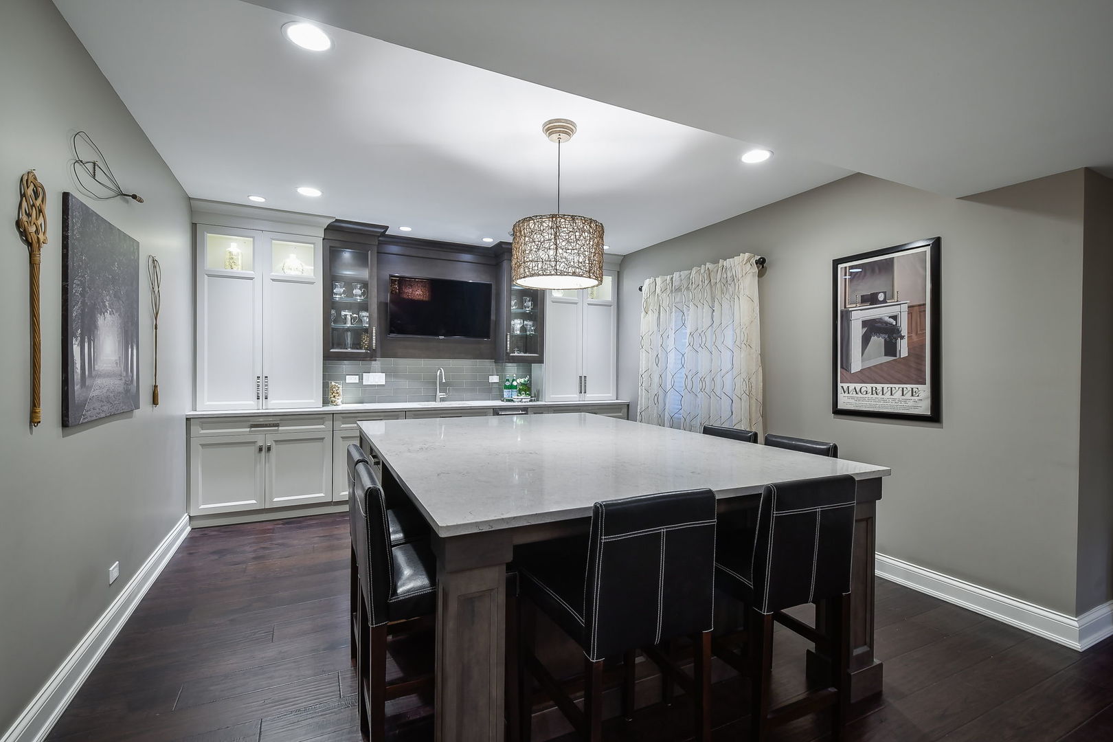 39-w914 Kellar Square Geneva, IL 60134 - Photo 47 of 68 a kitchen with kitchen island a dining table and chairs
