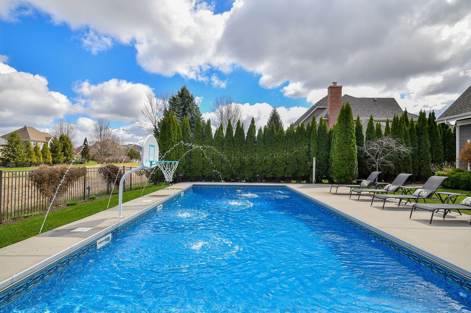 39-w914 Kellar Square Geneva, IL 60134 - Photo 55 of 68 a view of a swimming pool with a patio