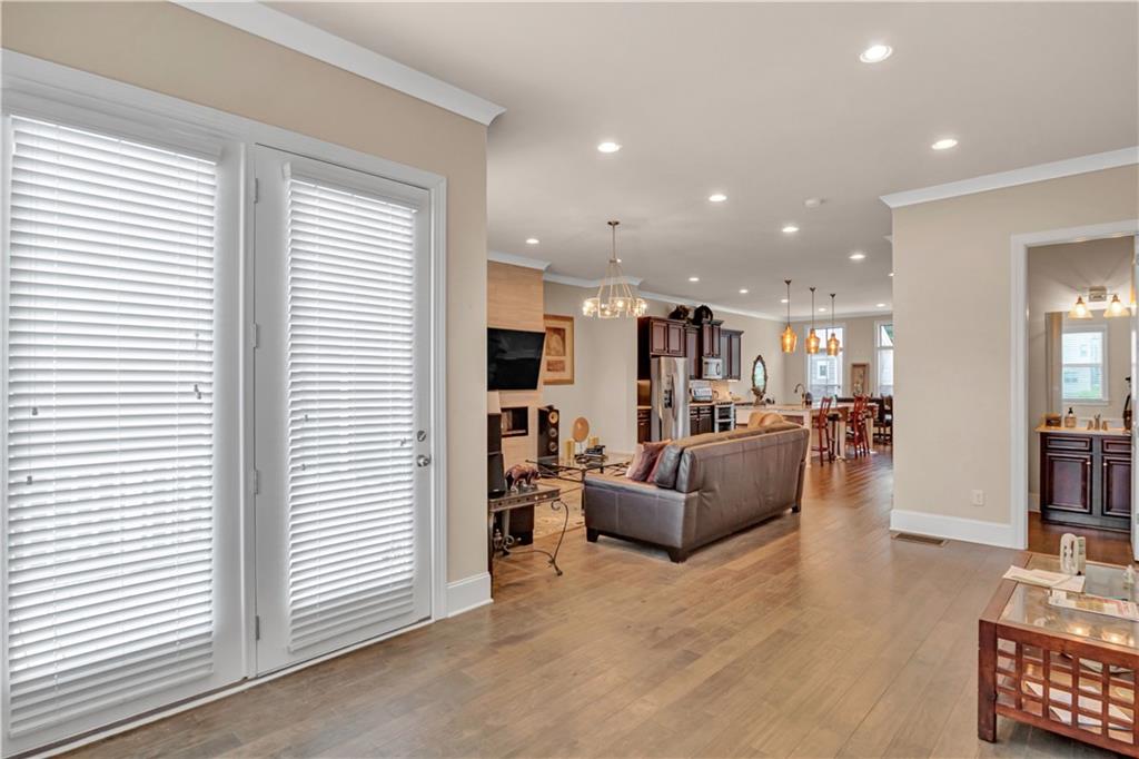 2453 Soft Maple Street Doraville, GA 30360 - Photo 16 of 30 a view of a living room kitchen with stainless steel appliances kitchen island