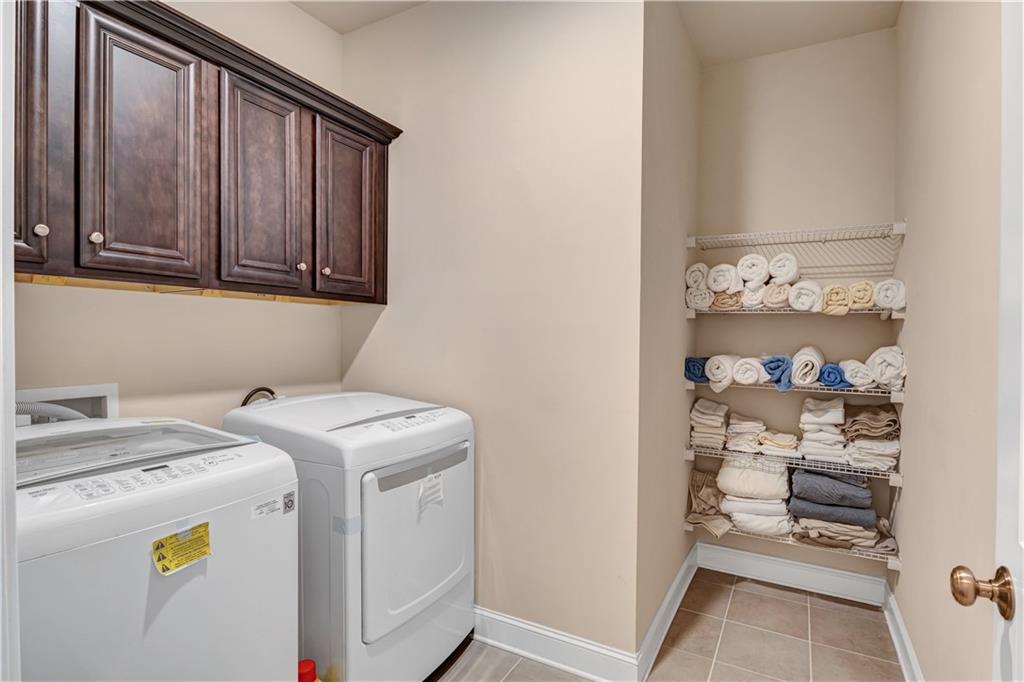 2453 Soft Maple Street Doraville, GA 30360 - Photo 23 of 30 a utility room with dryer and washer