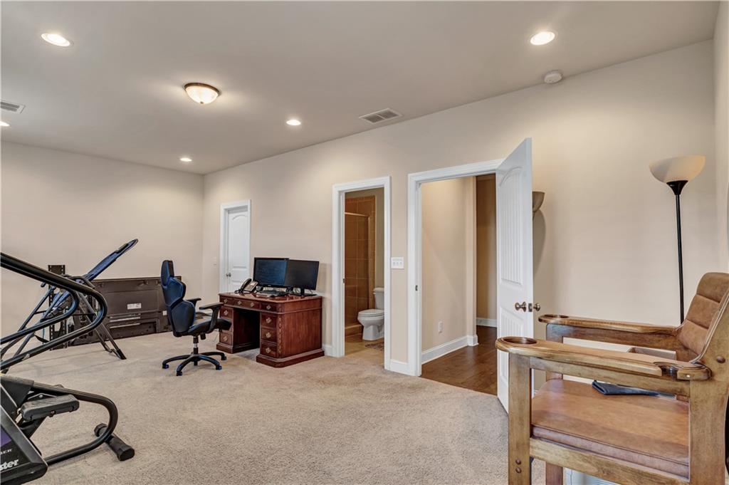 2453 Soft Maple Street Doraville, GA 30360 - Photo 27 of 30 a view of a room with gym equipment