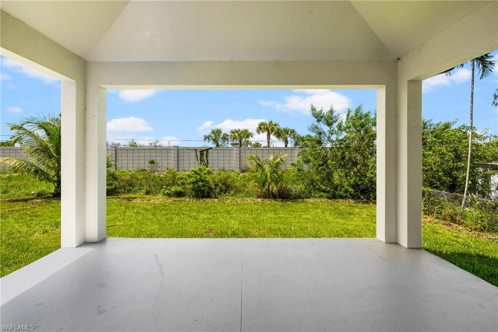 3049 Pine Tree Drive Naples, FL 34112 - Photo 37 of 38 a view of a city from a porch