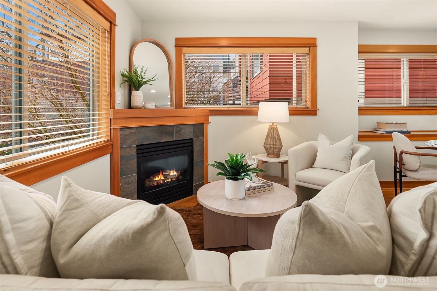 6537 34th Avenue Southwest Seattle, WA 98126 - Photo 6 of 22 a living room with furniture fireplace and a large window