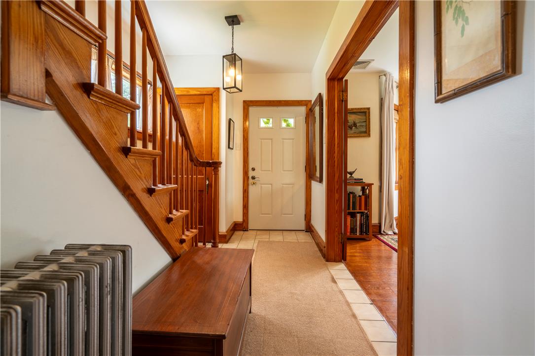 665 Point Phillips Road Bath, PA 18014 - Photo 8 of 73 A welcoming entry foyer features hardwood stairs and a practical, tiled floor.