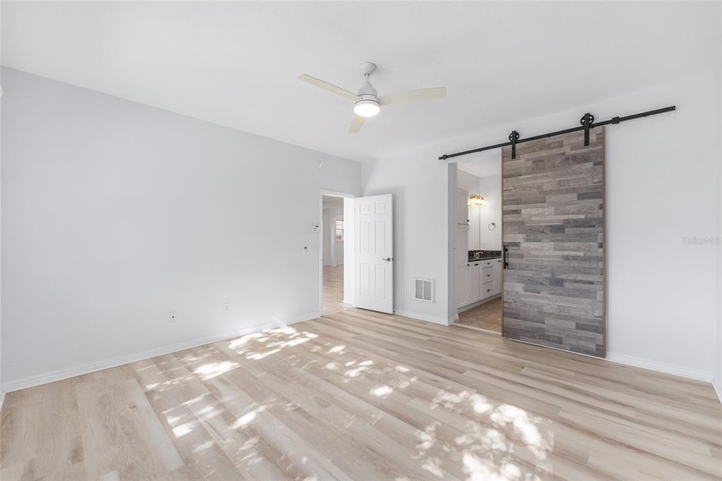 4970 Northwest 35th Ln Road Ocala, FL 34482 - Photo 27 of 41 a view of an empty room with a cabinet