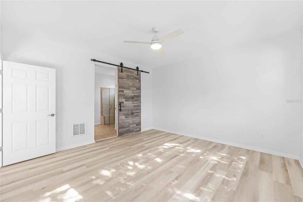 4970 Northwest 35th Ln Road Ocala, FL 34482 - Photo 28 of 41 a view of an empty room with a fireplace