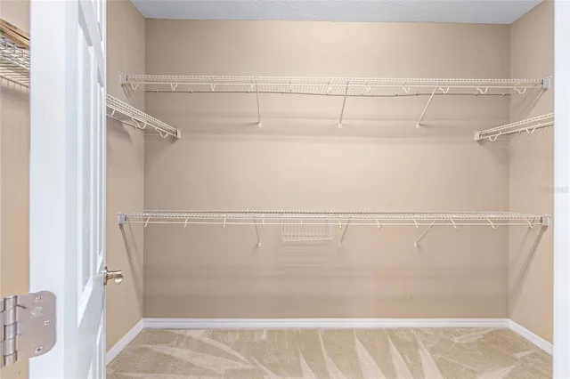 a view of a room with racks on the wall