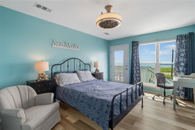 a bathroom with double sink and a mirror