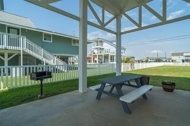 a view of an empty room with glass door