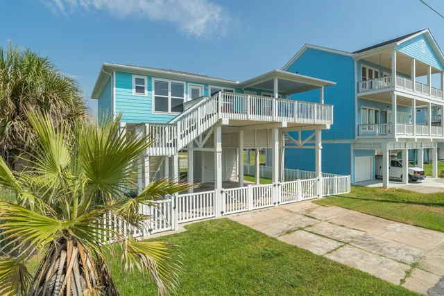 a view of a balcony with furniture