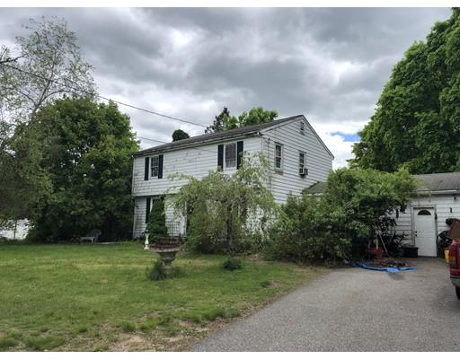 810 Main Street Hanover, MA 02339 - Photo 1 of 2 a front view of a house with a garden