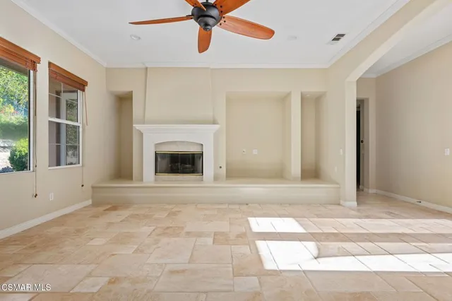 a view of livingroom with furniture and fireplace