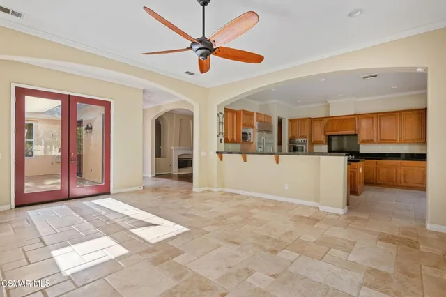 a view of a kitchen with a sink and cabinets