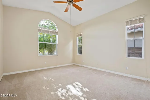 a view of storage and utility room with washer and dryer