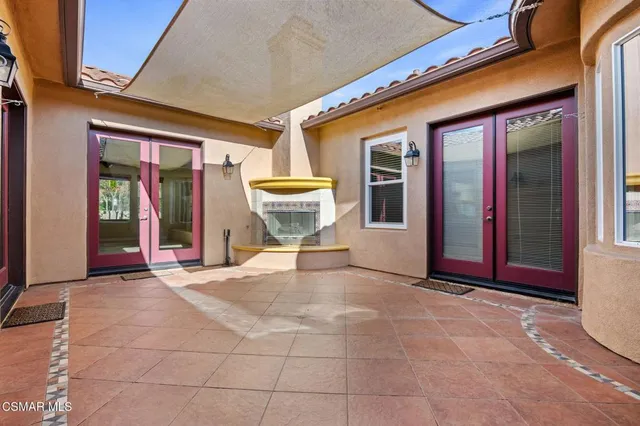 a view of a building with glass door and glass door