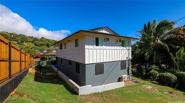 a house view with a garden space