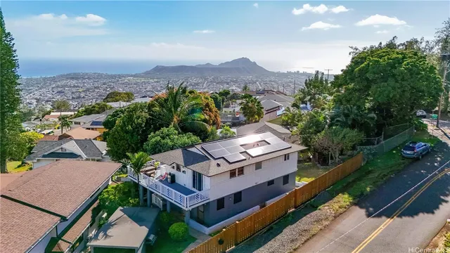an aerial view of a house with a garden