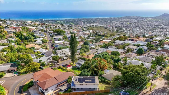 an aerial view of a city with lots of residential buildings