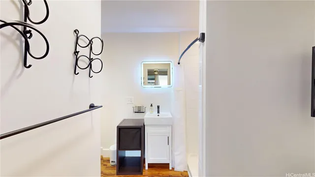 a bathroom with a sink and a mirror