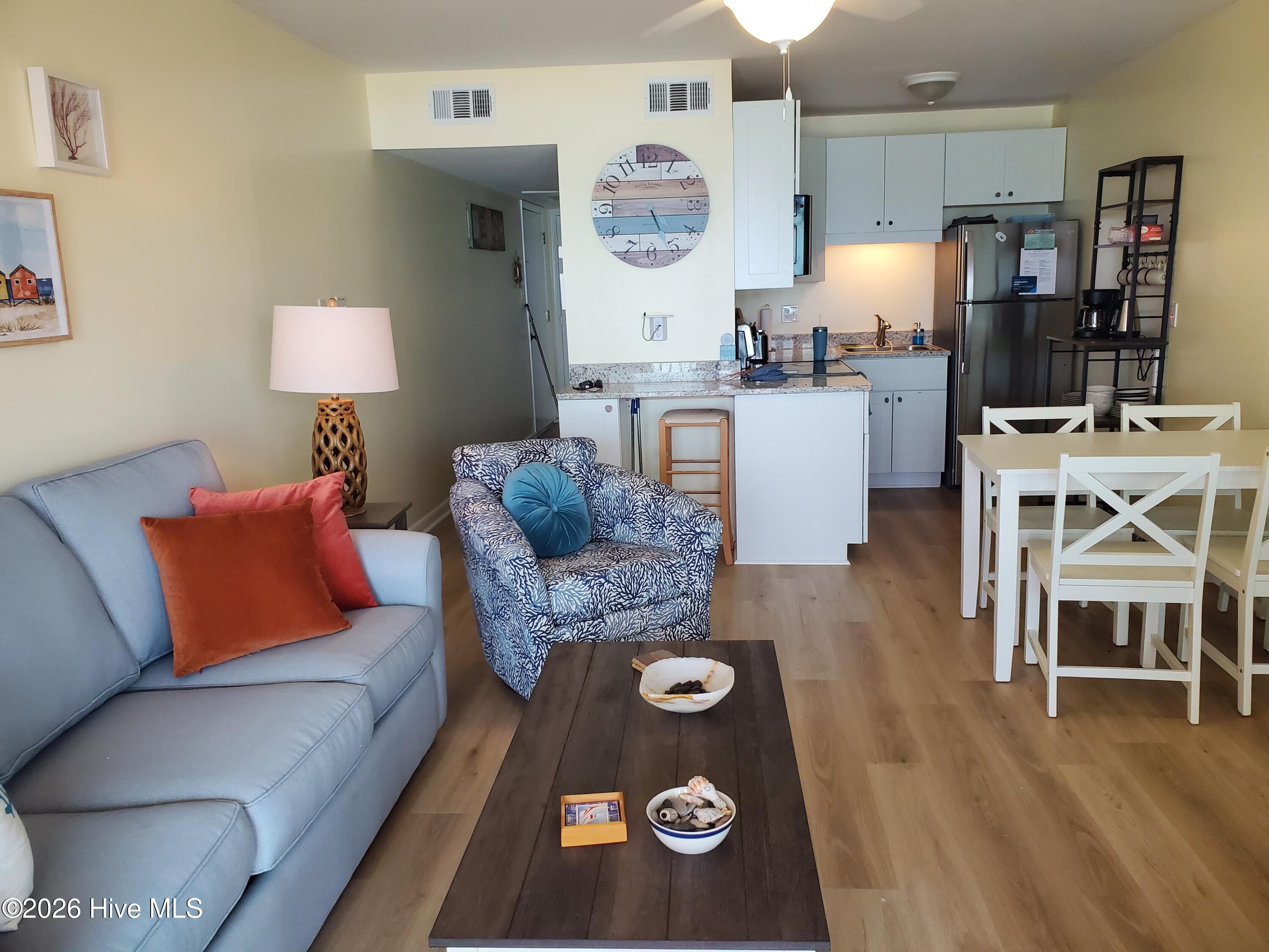 1822 New River Inlet Road, Unit 1304A North Topsail Beach, NC 28460 - Photo 7 of 22 Living Room 3