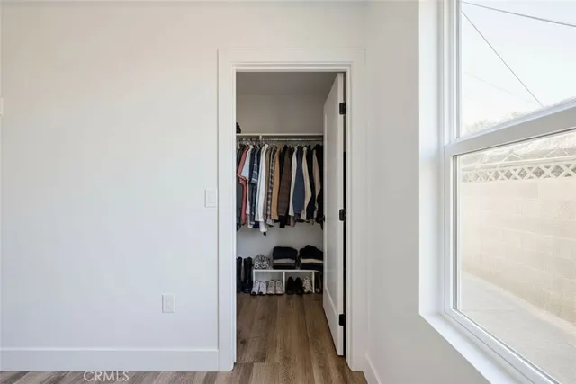 a view of a living room with closet