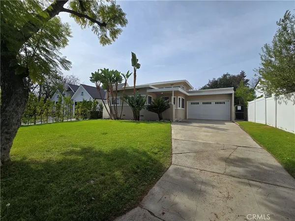 a view of a house with garden