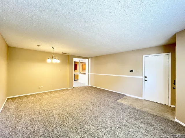 an empty room with a natural light