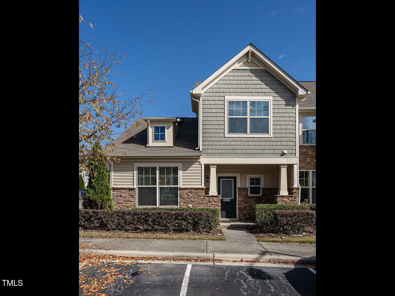 11 St Elias Drive Durham, NC 27705 - Photo 2 of 34 a front view of a house with yard and parking