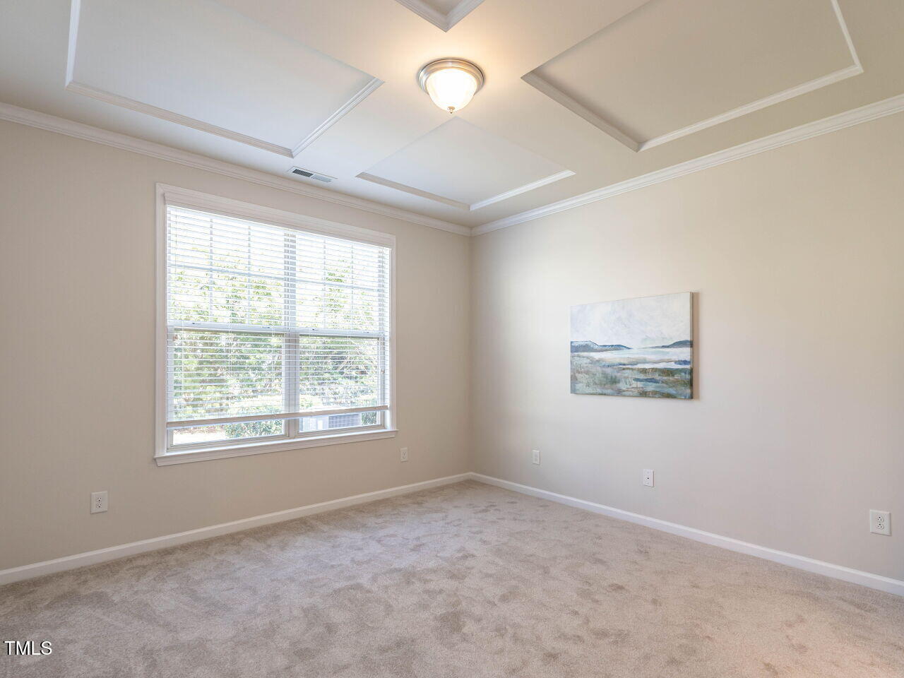 11 St Elias Drive Durham, NC 27705 - Photo 21 of 34 an empty room with a window