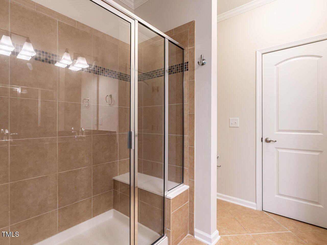 11 St Elias Drive Durham, NC 27705 - Photo 24 of 34 a bathroom with a shower