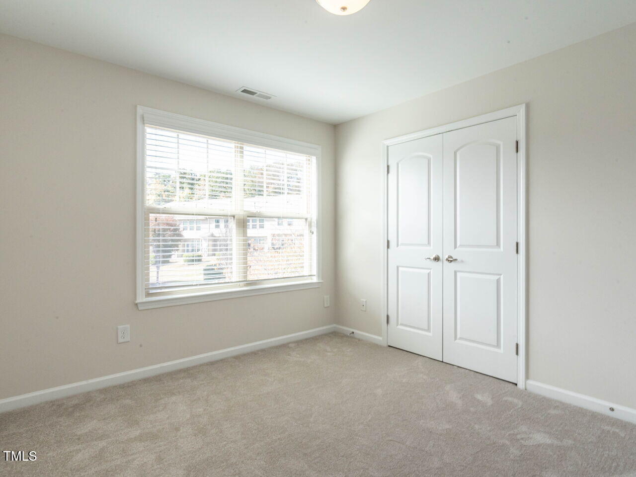 11 St Elias Drive Durham, NC 27705 - Photo 30 of 34 an empty room with windows