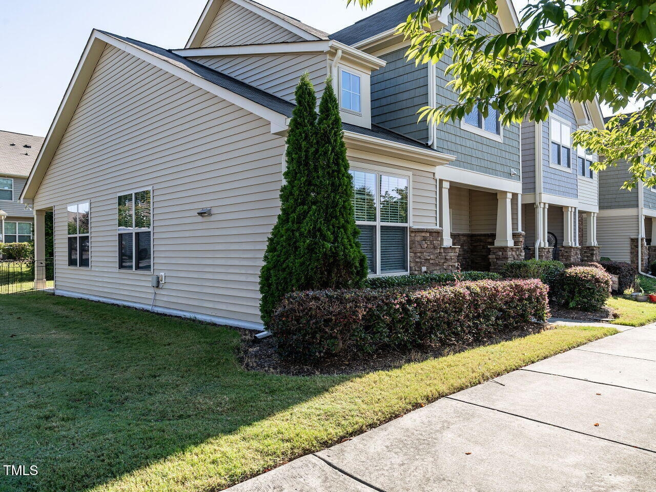 11 St Elias Drive Durham, NC 27705 - Photo 33 of 34 a front view of a house with a garden