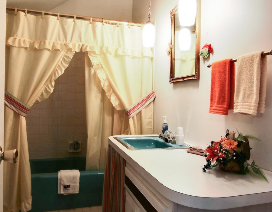 8430 West State Road Rockford, IL 61102 - Photo 18 of 25 a bathroom with a sink and a mirror