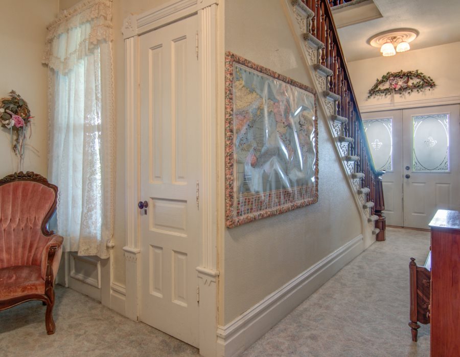 8430 West State Road Rockford, IL 61102 - Photo 4 of 25 a view of entryway with furniture and wooden floor