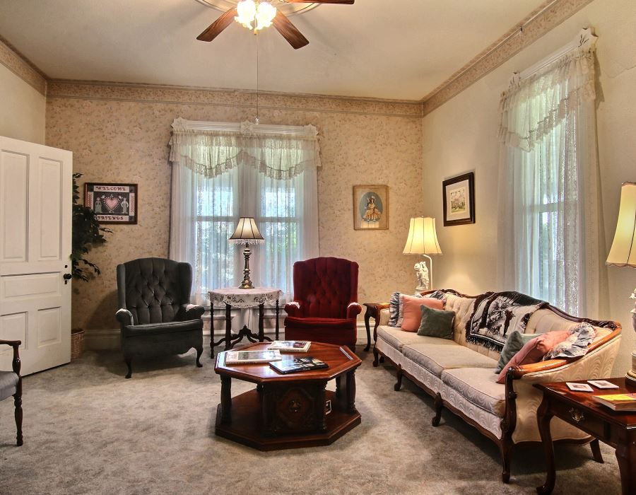 8430 West State Road Rockford, IL 61102 - Photo 5 of 25 a living room with furniture and a large window
