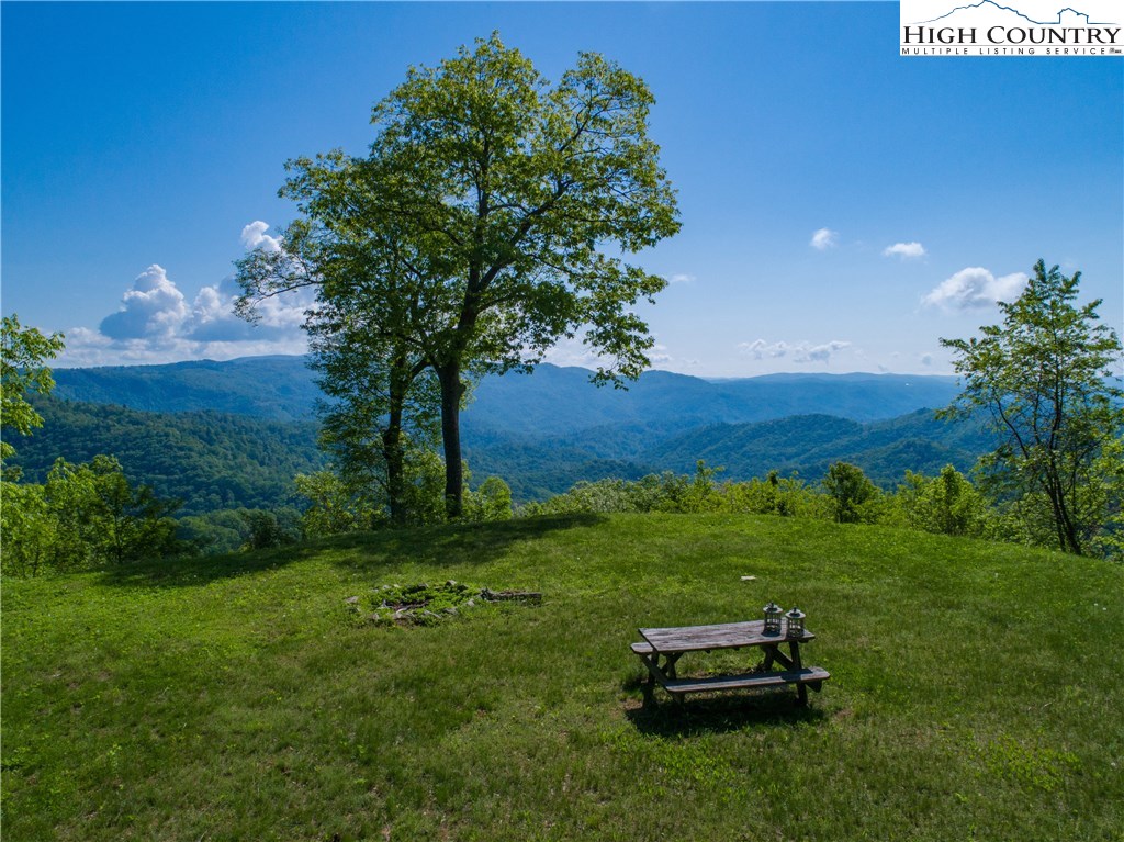 Storie Road Deep Gap, NC 28618 - Photo 4 of 27 a lake view with a garden