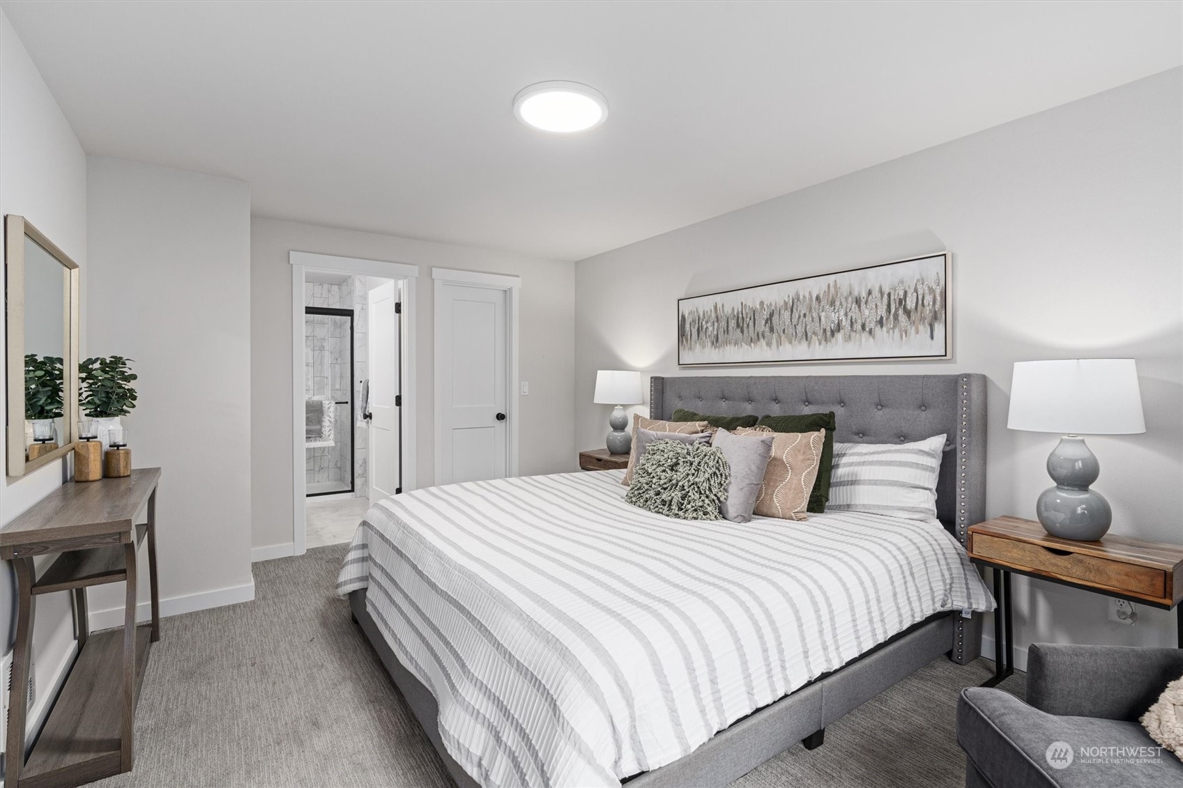 2412 Northwest 64th Street Seattle, WA 98107 - Photo 19 of 31 a bedroom with a bed and furniture