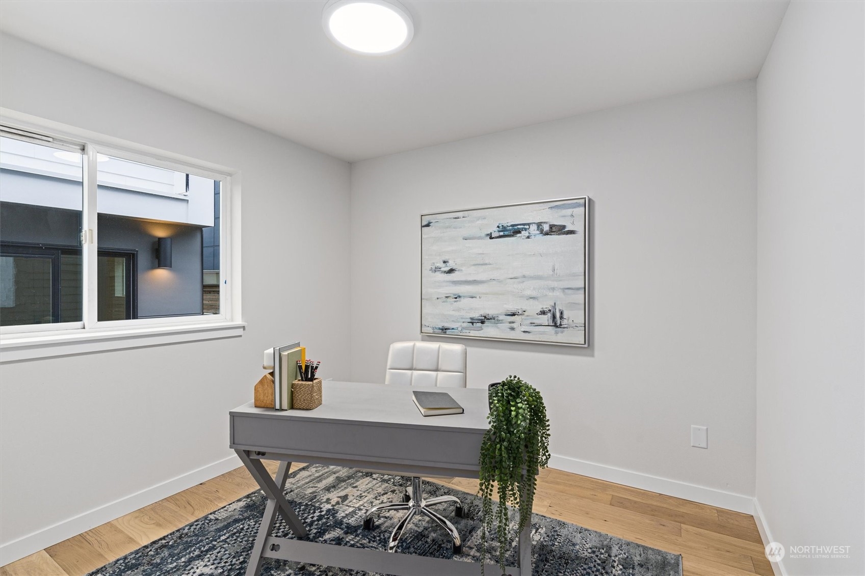 2412 Northwest 64th Street Seattle, WA 98107 - Photo 28 of 31 a workspace with furniture and window