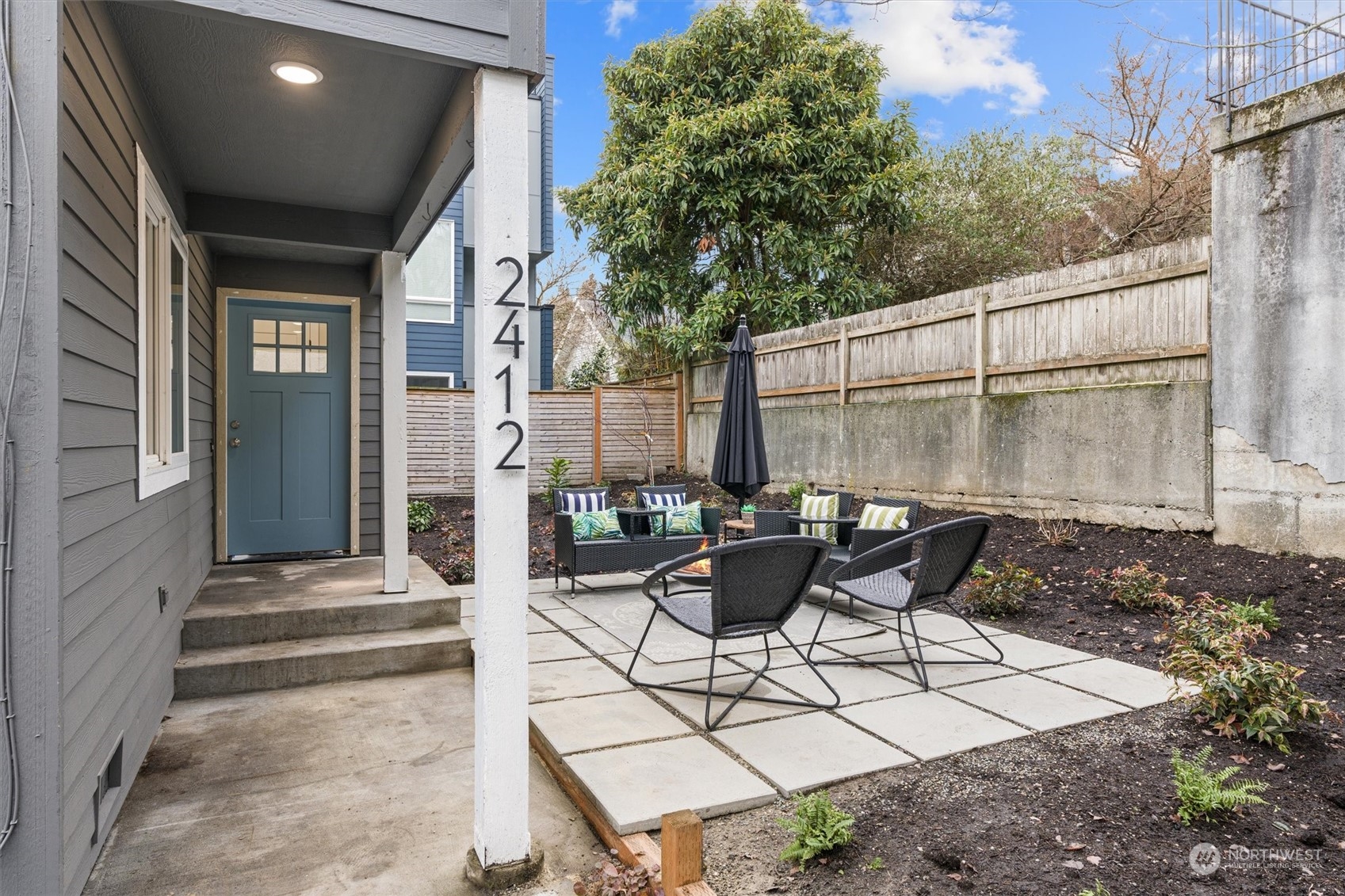 2412 Northwest 64th Street Seattle, WA 98107 - Photo 30 of 31 a view of a patio with couple of chairs and a fire pit