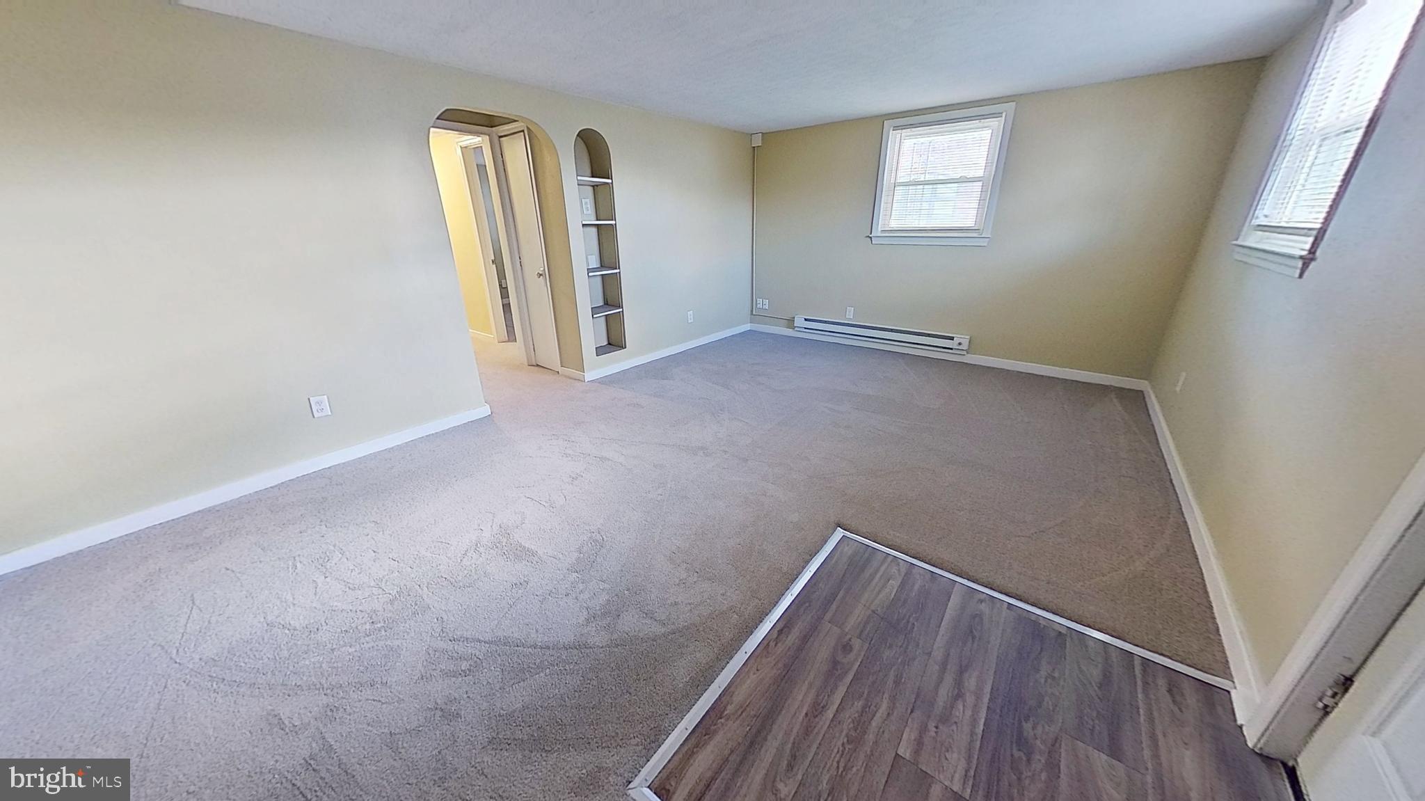 85 1st Avenue, Unit 3 Red Lion, PA 17356 - Photo 2 of 10 an empty room with windows