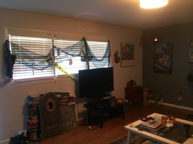1121 Carlton Avenue Raleigh, NC 27606 - Photo 12 of 14 a room with furniture and a window