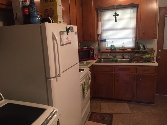 1121 Carlton Avenue Raleigh, NC 27606 - Photo 5 of 14 a utility room with dryer and washer